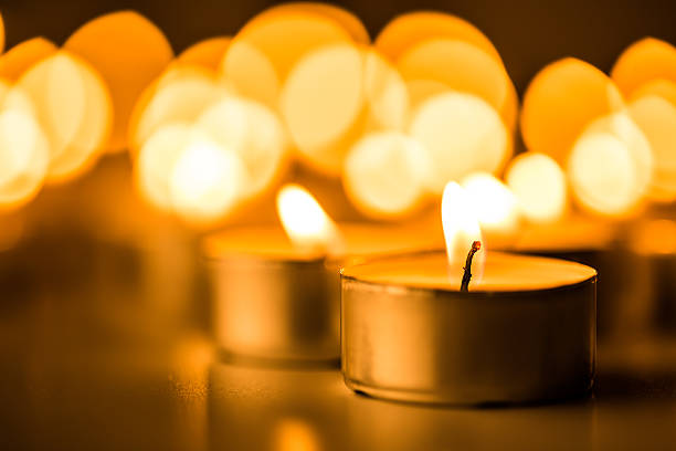istock Candles light. Christmas candles burning at night. 501283264