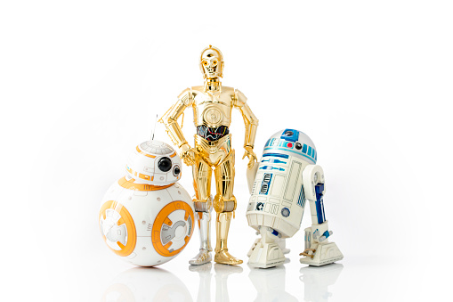 istanbul, Turkey - December 13, 2015: Star Wars droid toys r2d2, c3p0 and bb8 photographed on reflective white background.