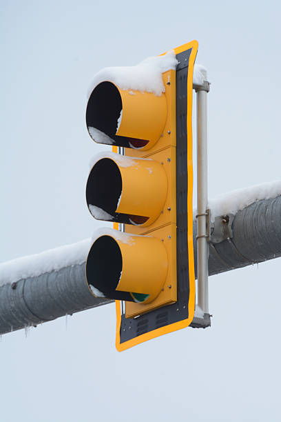 istock Traffic signal in snow 501287998