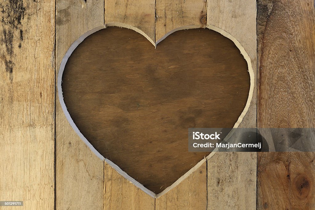 Love Valentines heart wooden frame brown background Love Valentines heart wooden frame from recycled old palette with dark brown wooden texture background, copy space Backgrounds Stock Photo