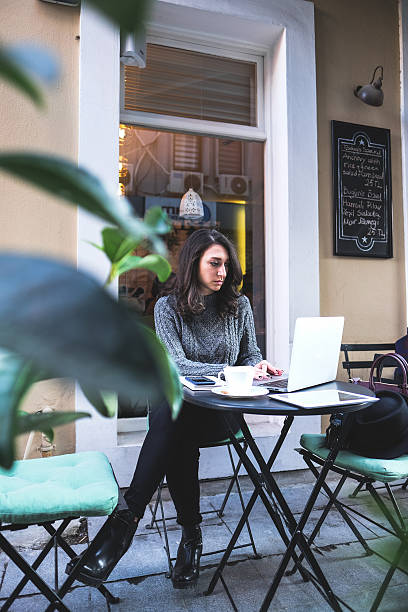 istock young woman working on her laptop 501291786