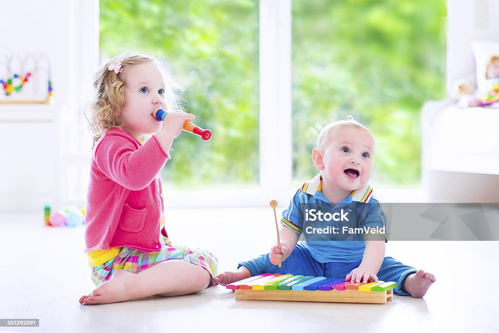 Cute Kids Playing Music With Xylophone Stock Photo - Download Image Now -  Baby - Human Age, Music, Preschool Student - iStock