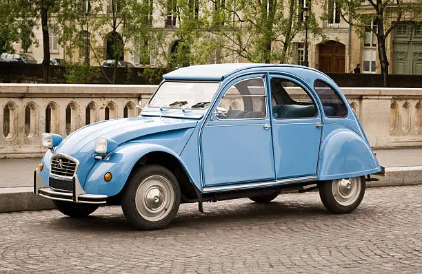The Citroën 2CV (French: "deux chevaux" i.e. "deux chevaux-vapeur" "two tax horsepower"  is a front-engine, front wheel drive, air-cooled economy car introduced at the 1948 Paris Mondial de l'Automobile and manufactured by Citroën for model years 1948-1990 in a single four-door body style.