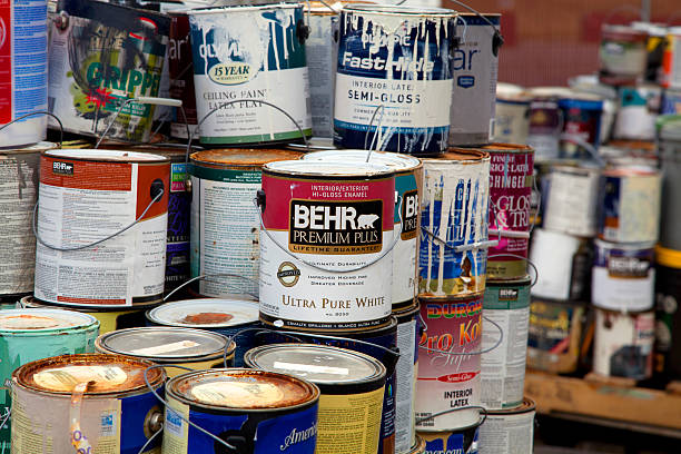 Old paint cans stock photo