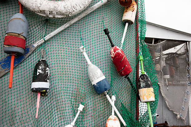 Fishing nets and lobster buoys on the wall of the fisherman's shack