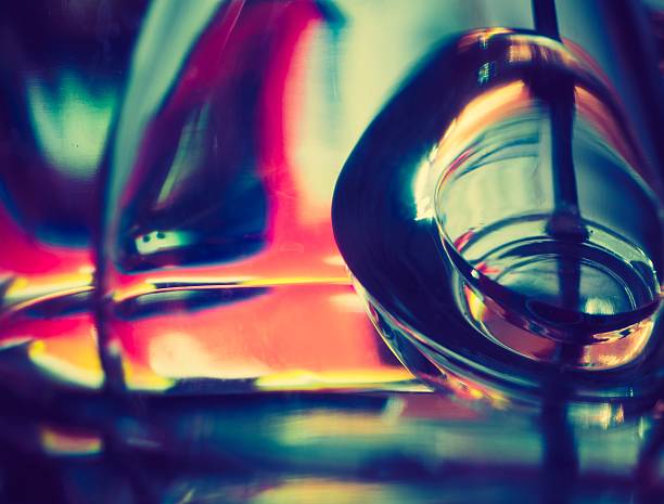 Vintage photo of thick glass abstraction made with glass vase and glass on shallow depth of field.