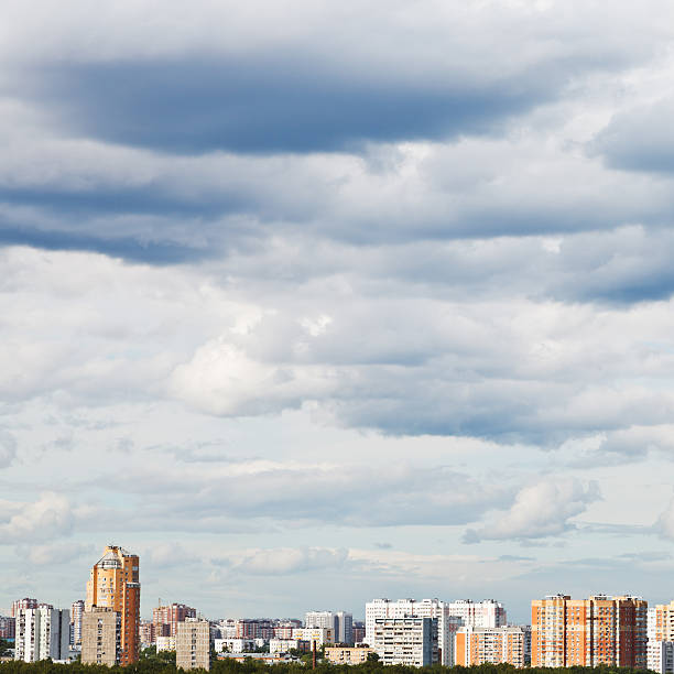 istock overcast grey sky over town in summer 501296905