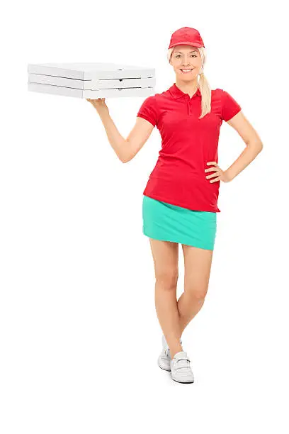 Photo of Pizza delivery girl holding boxes