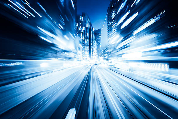 istock traffic with blur light through city at night 501297405