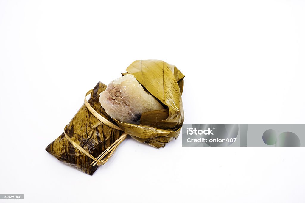 Banana with sticky rice, Khao Tom Mat Sticky rice stir with coconut milk  and banana filling, wrapped by banana leaf Asia Stock Photo