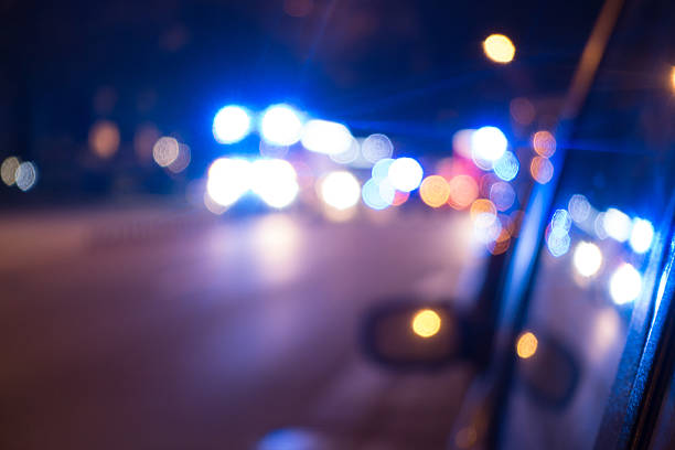 istock Ambulance in traffic at night 501329878