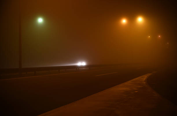 istock Night scene on the road with fog 501331624