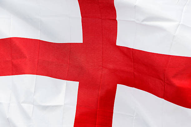 istock England flag in the wind in sunlight 501335949