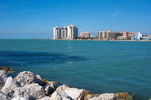 View of Clearwater beach A side view of a few Clearwater beach buildings from the opposite side of the bay. clearwater stock pictures, royalty-free photos & images