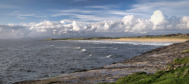 Bundoran surfers beach panorama Bundoran, County Donegal, Ireland. While very few people automatically think of Ireland when they think of surfing, the waves that break at Bundoran are some of the worldâs best. bundoran stock pictures, royalty-free photos & images