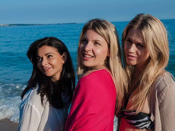 istock Friends posing for a photo in the beach 501336766