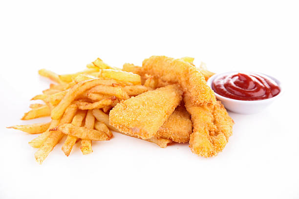 istock french fries and fried chicken nuggets 501336829