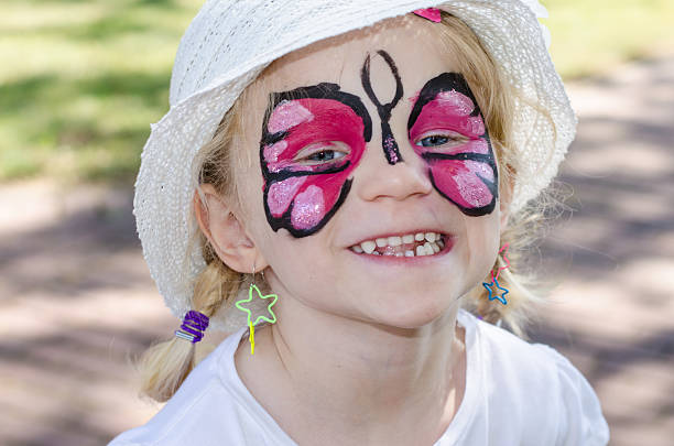 istock child with face painting 501337131