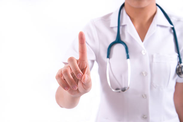 istock doctor pushing or pointing a transparent screen 501337259