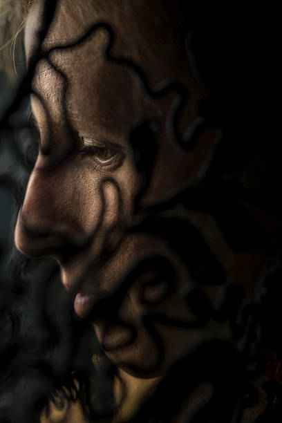 istock Evocative portrait of a woman in deep shadow 501341141