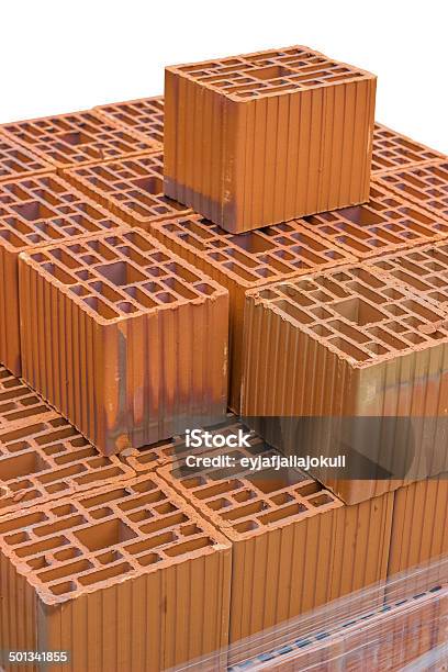 Stacked Orange Hollow Clay Block For Building Construction Stock Photo - Download Image Now