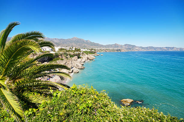 Nerja beach, famous touristic town, costa del sol, Málaga, Spain. Nerja beach, famous touristic town in costa del sol, Málaga, Andalusia, Spain. costa del sol málaga province photos stock pictures, royalty-free photos & images