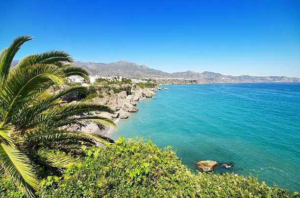 Photo of Nerja beach, famous touristic town, costa del sol, Málaga, Spain.