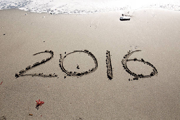 istock New Year Carved in Sand-2016 501341948