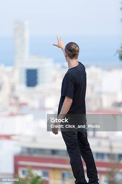 Pulling Handd Back Back View Of Young Hipster Pulling His Hand Away Stock Photo - Download ...