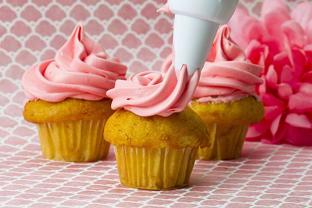 istock close up image of cupcake and icing bag 501343496