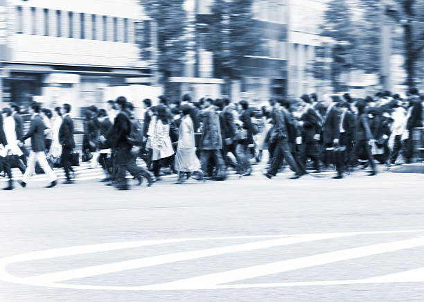 istock City Commuters at Crosswalk wjth Blur Motion 501355498