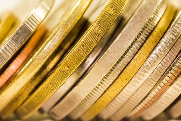 istock selective focus golden coins and coins stacked on each other 501359608