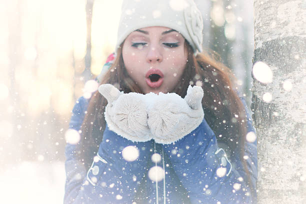istock winter girl snowball 501361456