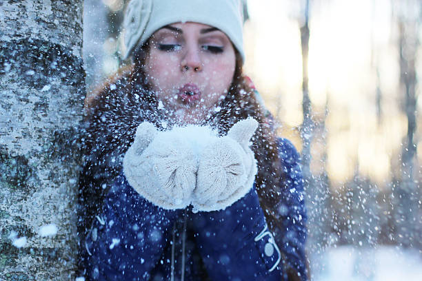 istock winter girl snowball 501362148