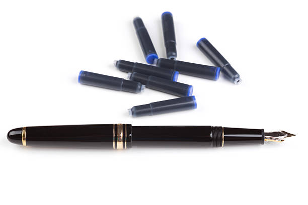 fountain pen and cartridges over white background