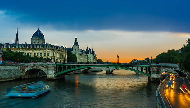istock Palais de Justice, night view over the Seine 501362631