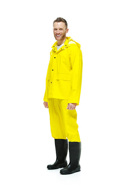istock Smiling man in raincoat and looking at camera 501362920