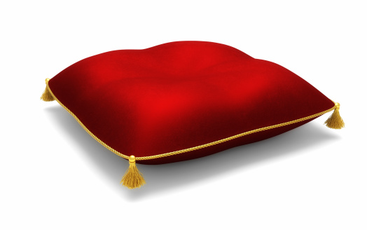 Royal red pillow isolated on white