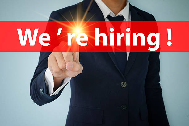 istock Businessman hand touching WE ARE HIRING tab on virtual screen 501364136