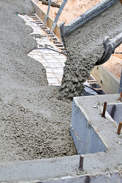 Pouring Concrete Slab stock photo