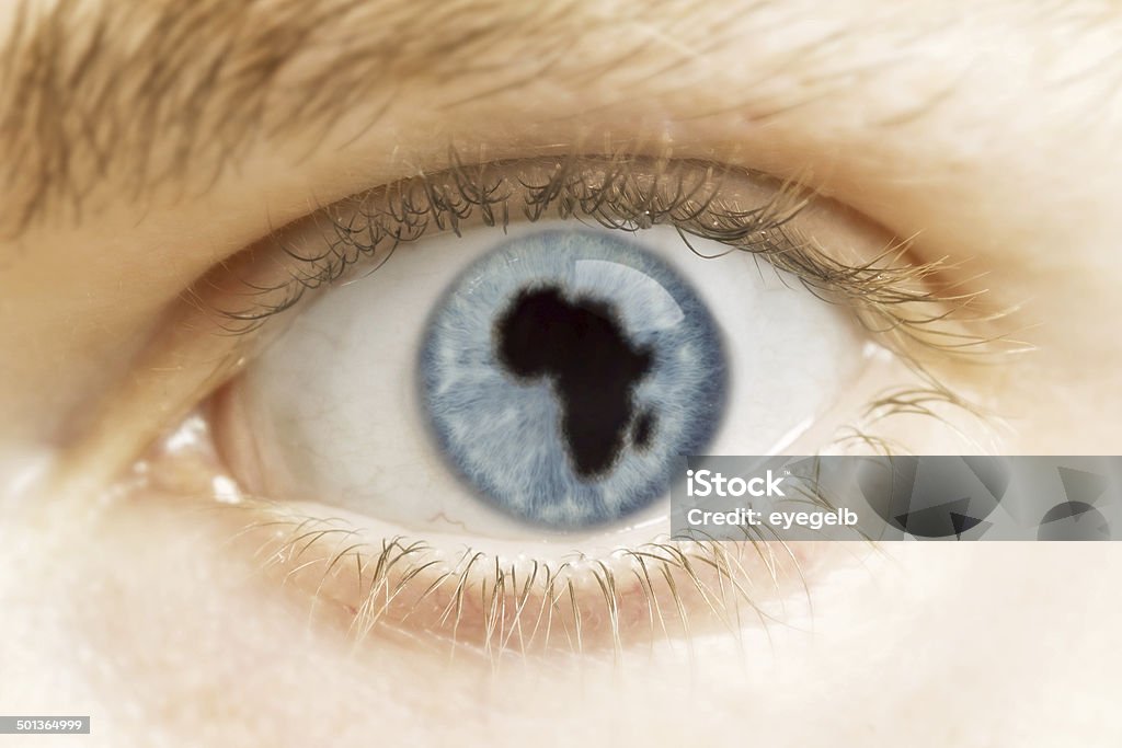 Close-up of an eye  (pupil in the shape of Africa) A close-up of an eye with the pupil in the shape of Africa.(series) Adult Stock Photo