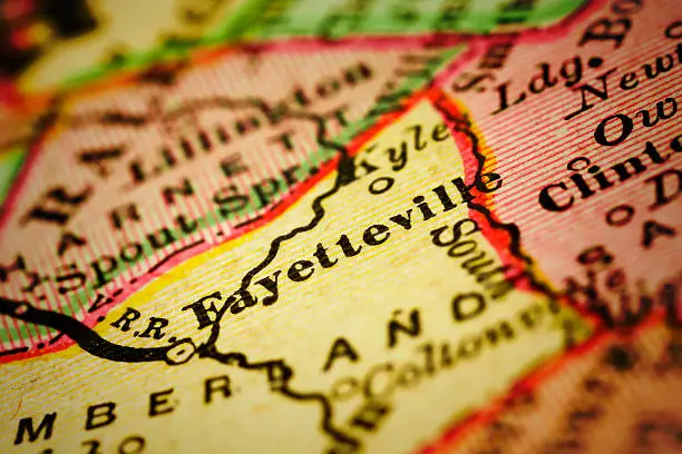Fayetteville, North Carolina on 1880's map. Selective focus and Canon EOS 5D Mark II with MP-E 65mm macro lens.