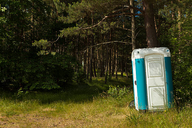 istock Portable Toilet in forest 501366275