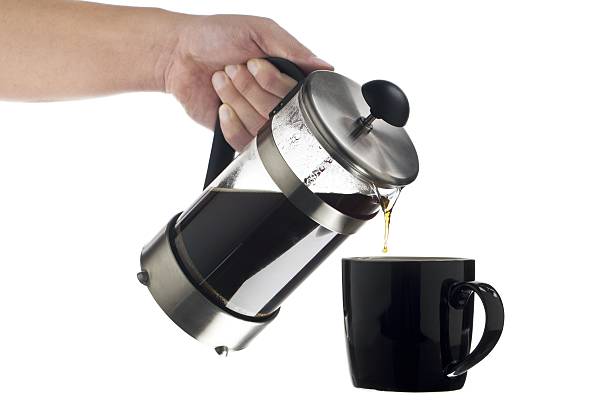 istock cropped image of a human hand serving coffee 501369000