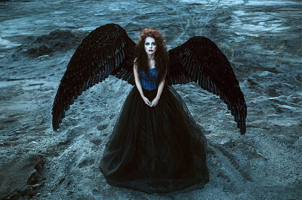 istock Angel with black wings 501369282