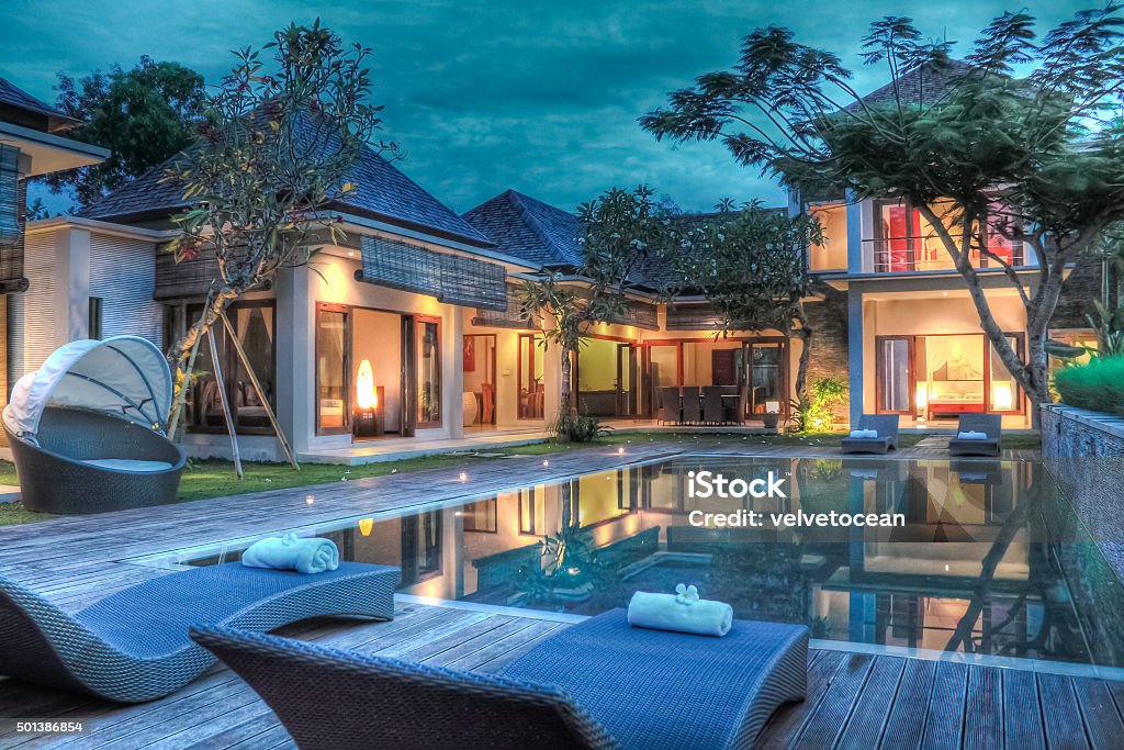Tropical modern villa A modern tropical villa at sunset Luxury Stock Photo