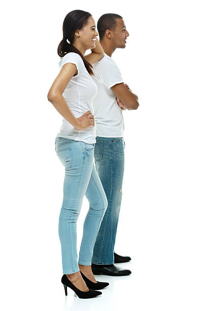 istock Smiling couple standing and looking away 501387770
