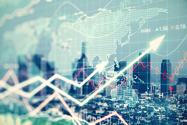 istock Double explosure with businesss charts and financial district of 501389450