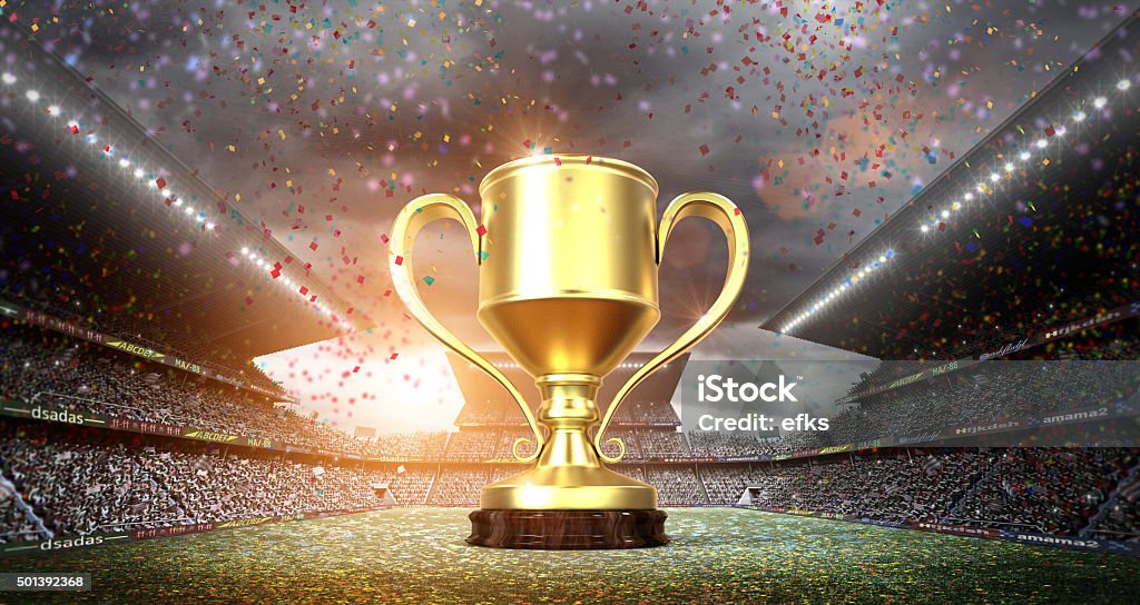 winners cup in the stadium An imaginary stadium and winners cup are modelled and rendered. Soccer Stock Photo