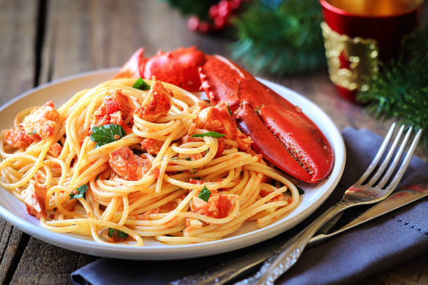 Lobster spaghetti Spaghetti all'astice or Lobster spaghetti for Christmas crab seafood photos stock pictures, royalty-free photos & images